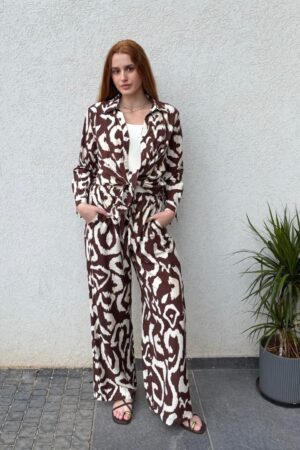 מכנס חום-לבן בהדפס גרפי, סיומת מתרחבת עם כיסים - יבוא מפריז