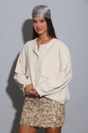 VERTIGO גקט נלה עם תקתקים וכיווצים