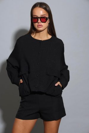 VERTIGO גקט נלה עם תקתקים וכיווצים